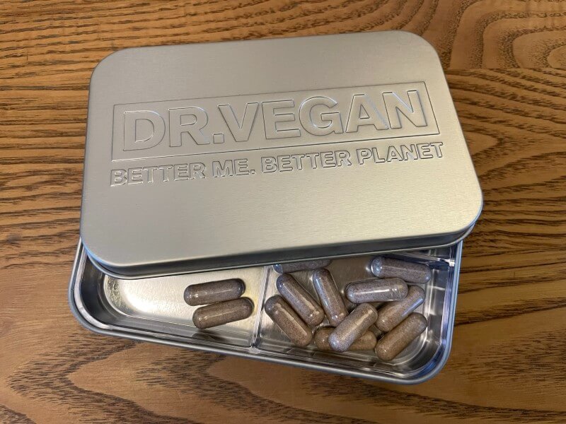 Dr vegan pill tin with iron capsules inside