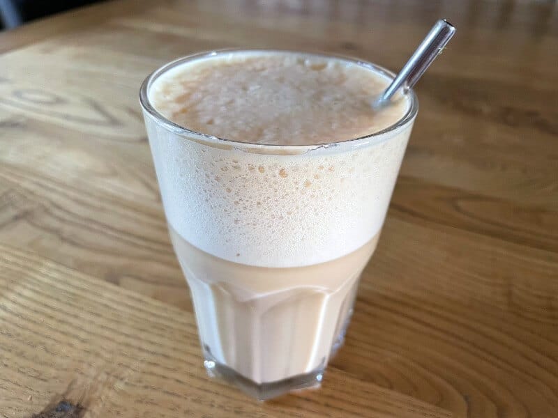 Form vanilla protein in a glass